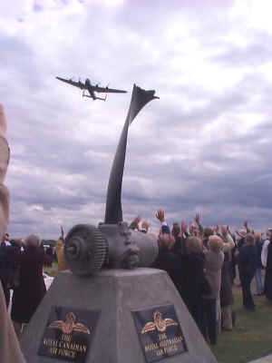 Lancaster flypast during dedication of the airfield memorial